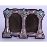 AN ART NOUVEAU STYLE SILVER AND ENAMEL PHOTOGRAPH FRAME. 10 cm x 7.5 cm