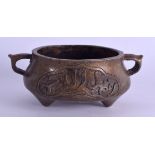 A CHINESE TWIN HANDLED BRONZE ISLAMIC MARKET CENSER bearing Xuande marks to base. 15 cm wide,