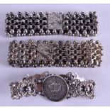 A 19TH CENTURY CONTINENTAL SILVER COIN BRACELET together with a pair of white metal chainlink
