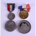 A CORONATION MEDALLION together with a silver jubille medal and two others. (4)