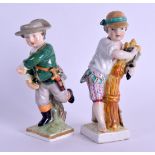 TWO GERMAN PORCELAIN FIGURES upon square form bases. 11 cm high. (2)