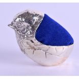 A SILVER BIRD PIN CUSHION. 5 cm wide.