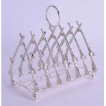 A NOVELTY HUNTING TOAST RACK. 11 cm wide.
