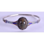 A GOOD EGYPTIAN REVIVAL SILVER AND ENAMEL SCARAB BEETLE BANGLE. 8.5 cm wide.