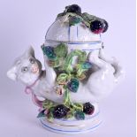 AN UNUSUAL 19TH CENTURY CONTINENTAL PORCELAIN CAT BOX AND COVER overlaid with berries. 16 cm x 13