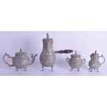 AN 18TH/19TH CENTURY DUTCH SILVER FOUR PIECE TEASET with figural spouts and extensive decoration.