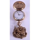 A VINTAGE YELLOW GOLD FOB WATCH upon a yellow metal chain. 38.6 grams overall. 3 cm diameter.