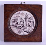 AN 18TH CENTURY PUCE DELFT TILE painted with figures and a baby upon a river. Tile 12.5 cm