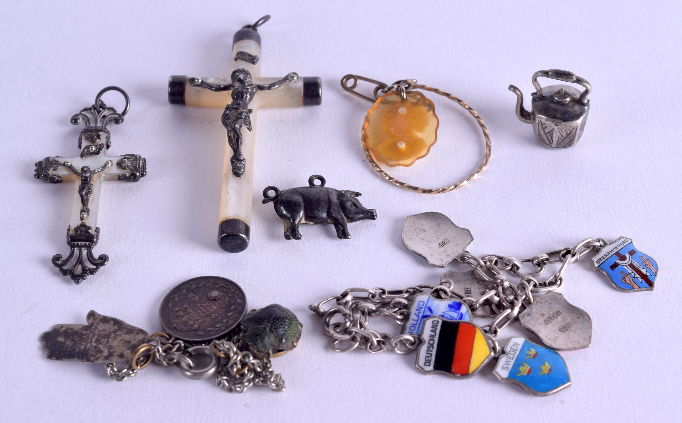 A SILVER CHARM BRACELET together with other items. (qty)