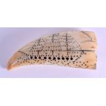 A RARE 19TH CENTURY CARVED PIQUE WORK SCRIMSHAW TOOTH unusually formed depicting a boat with small