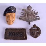 A MILITARY NYASALAND POLICE BADGE together with a Naafi badge, ceramic head & a badge. (4)