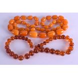 TWO AMBER TYPE NECKLACES. 155 grams. (2)