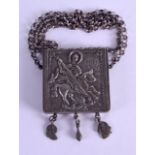 AN 18TH CENTURY RUSSIAN SILVER PENDANT deocrated with a Saint upon a horse. 93 grams. Pendant 5.25