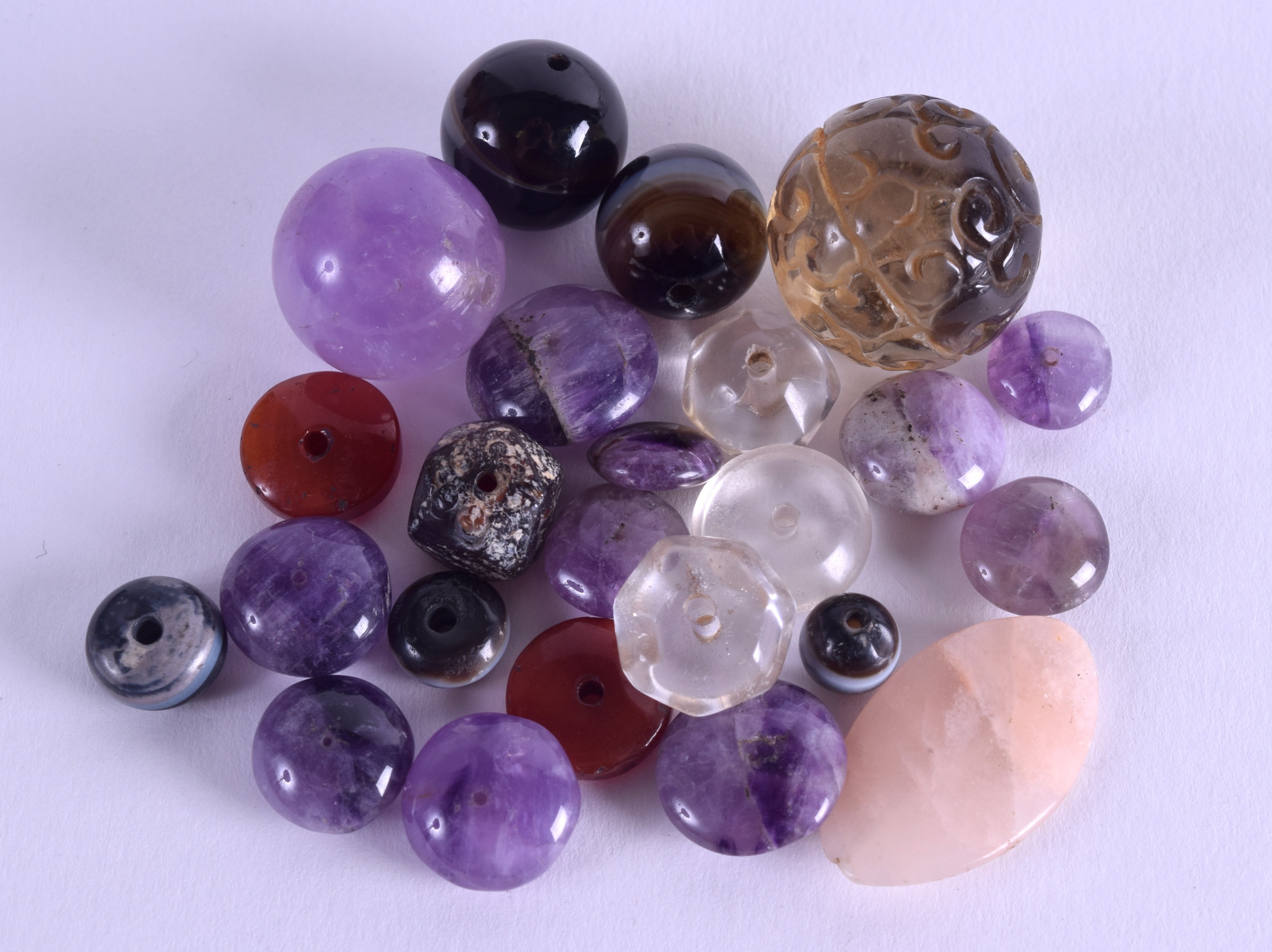 A GROUP OF 19TH CENTURY BEADS including amethyst. (qty)