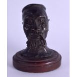 AN EARLY 20TH CENTURY CONTINENTAL BRONZE BUST OF AN AFRICAN MALE. Bronze 11 cm high.