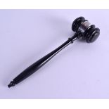 A 1950S EBONY AND SILVER AUCTIONEERS GAVEL. 26 cm long.