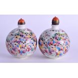 TWO CHINESE PORCELAIN SCENT BOTTLES painted with figures within landscapes. 7.75 cm high.