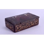 A 19TH CENTURY PERSIAN QAJAR LACQUER SNUFF BOX decorated with figures. 8.5 cm x 5.5 cm.