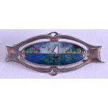 A STYLISH ENGLISH SILVER AND ENAMEL MARITIME BROOCH painted with a boat upon crashing waves. 3 cm