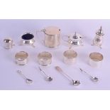 THIRTEEN PIECES OF SILVER including a condiment set. Various dates. Silver 385 grams. (13)