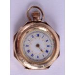 AN EDWARDIAN 14CT GOLD FOB WATCH. 23.6 grams. 3 cm wide.