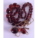A CHERRY AMBER NECKLACE. 83 grams.