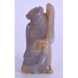 A 19TH CENTURY CHINESE CARVED AGATE FIGURE OF A YOUNG CHILD modelled beside a lucky toad. 8.5 cm x 4