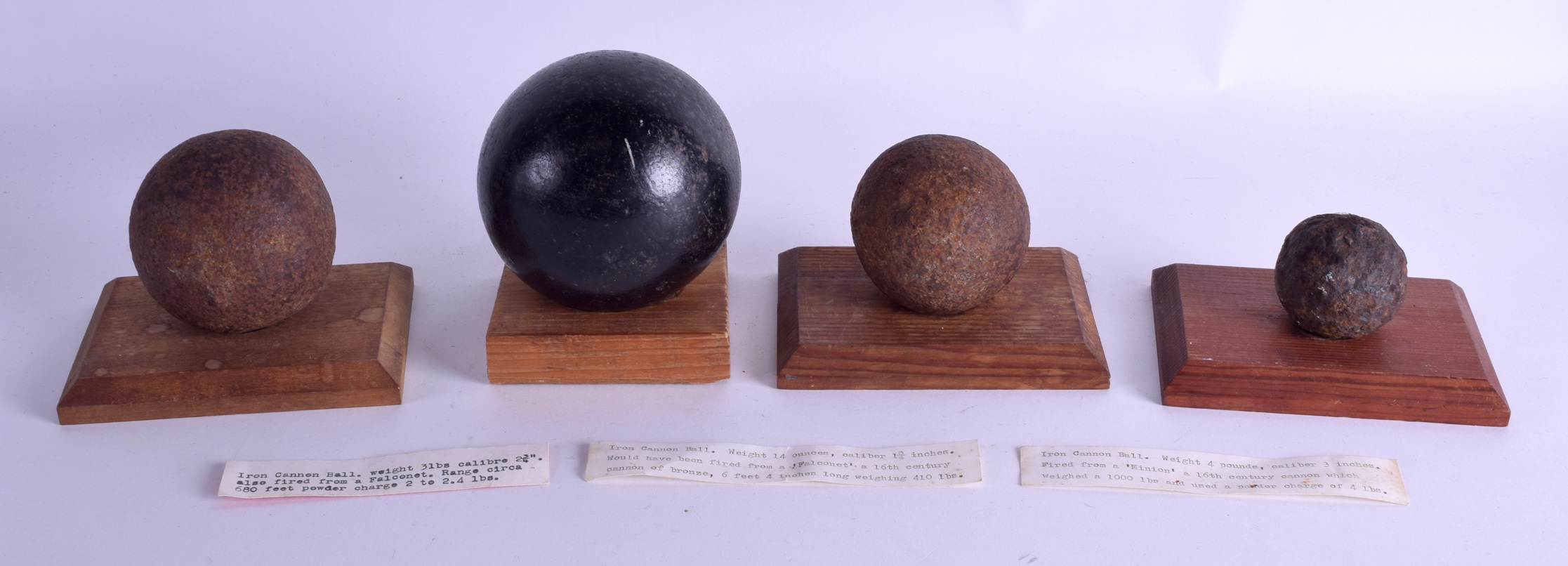 FOUR 16TH/17TH CENTURY CANNONBALLS. Largest 7 cm wide. (4)