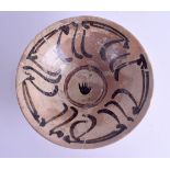 A CENTRAL ASIAN MIDDLE EASTERN PERSIAN KASHAN POTTERY BOWL painted with brown glazed script. 27 cm d