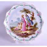 A 19TH CENTURY FRENCH LILLE POTTERY CIRCULAR PLATE bearing pseudo 1767 marks to base, painted with l