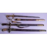THREE ANTIQUE GERMAN ANTLER HORN HANDLED SWORDS one carved with a figure. Largest 73 cm long. (3)