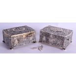 A RARE PAIR OF 19TH CENTURY CONTINENTAL SILVER WIND UP BIRD BOXES decorated with figures encased wit