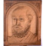 A CARVED WOODEN PLAQUE DEPICTING A MALE, "1524 PALESTRINA 1594". 25.5 cm x 21 cm.