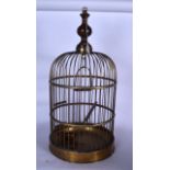 A LARGE ANTIQUE BIRD CAGE, formed with turned mahogany finial. 66 cm high.