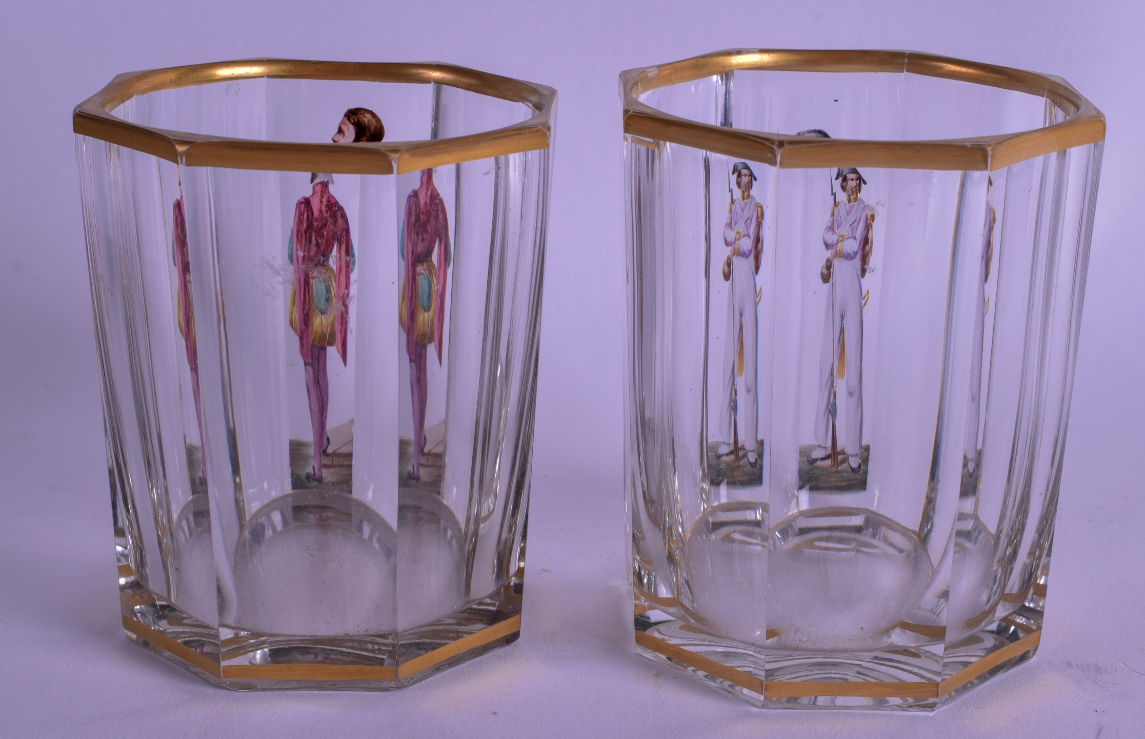 A PAIR OF EARLY 19TH CENTURY AUSTRO GERMAN ENAMELLED GLASSES painted with figures under a gilt rim. - Bild 2 aus 2