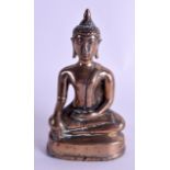 A 19TH CENTURY SOUTH EAST ASIAN BRONZE BUDDHA modelled seated upon a triangular base. 14.5 cm high.