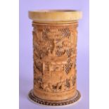A 19TH CENTURY CHINESE CANTON CARVED IVORY BRUSH POT Qing, carved with figures within landscapes. 10