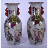 A PAIR OF 20TH CENTURY CHINESE PORCELAIN CRACKLE GLAZED VASES, decorated with children in various pu