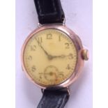 A 9CT GOLD VINTAGE WRISTWATCH with small subsidiary dial. 3 cm wide.