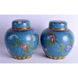 A PAIR OF EARLY 20TH CENTURY CHINESE CLOISONNE ENAMEL GINGER JARS AND COVERS Qing/Republic, decorate