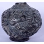 AN EASTERN POTTERY JAR, moulded with animals in various pursuits. 16 cm wide.