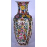 A 20TH CENTURY CHINESE FAMILLE ROSE PORCELAIN VASE, decorated with birds amongst foliage. 33 cm high