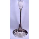 A SOLID SILVER SIFTER SPOON OR STRAINER,, bearing Sheffield hallmarks. 15.5 cm long.