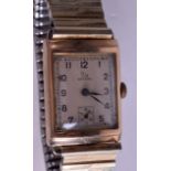 A VINTAGE 9CT GOLD RECORD WRISTWATCH. 2 cm x 2.75 cm.