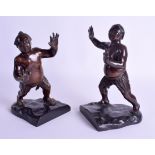 A RARE PAIR OF 19TH CENTURY JAPANESE MEIJI PERIOD BRONZE SAMURAI BOOKENDS modelled upon naturalistic