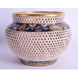 A STYLISH HUNGARIAN EMIL FISCHER RETICULATED BOWL Zsolnay Pecs style, painted with floral sprays. 15
