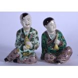 A PAIR OF EARLY 20TH CENTURY CHINESE FAMILLE VERTE PORCELAIN FIGURE OR STATUE, formed as two seated
