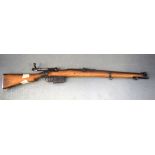 A VINTAGE BOLT ACTION RIFLE. 111 cm long.