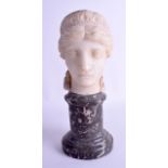 AN 18TH/19TH CENTURY EUROPEAN CARVED WHITE MARBLE HEAD OF A FEMALE possibly a representation of Dian