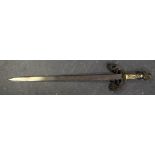 A SPANISH TOLEDO SWORD, etched with a knight on horseback, "Tizona Del Cid" and ivorine handle. 74 c